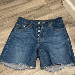 Levi’s High rise size 24, fits 25 waist as well. Denim shorts, medium dark wash